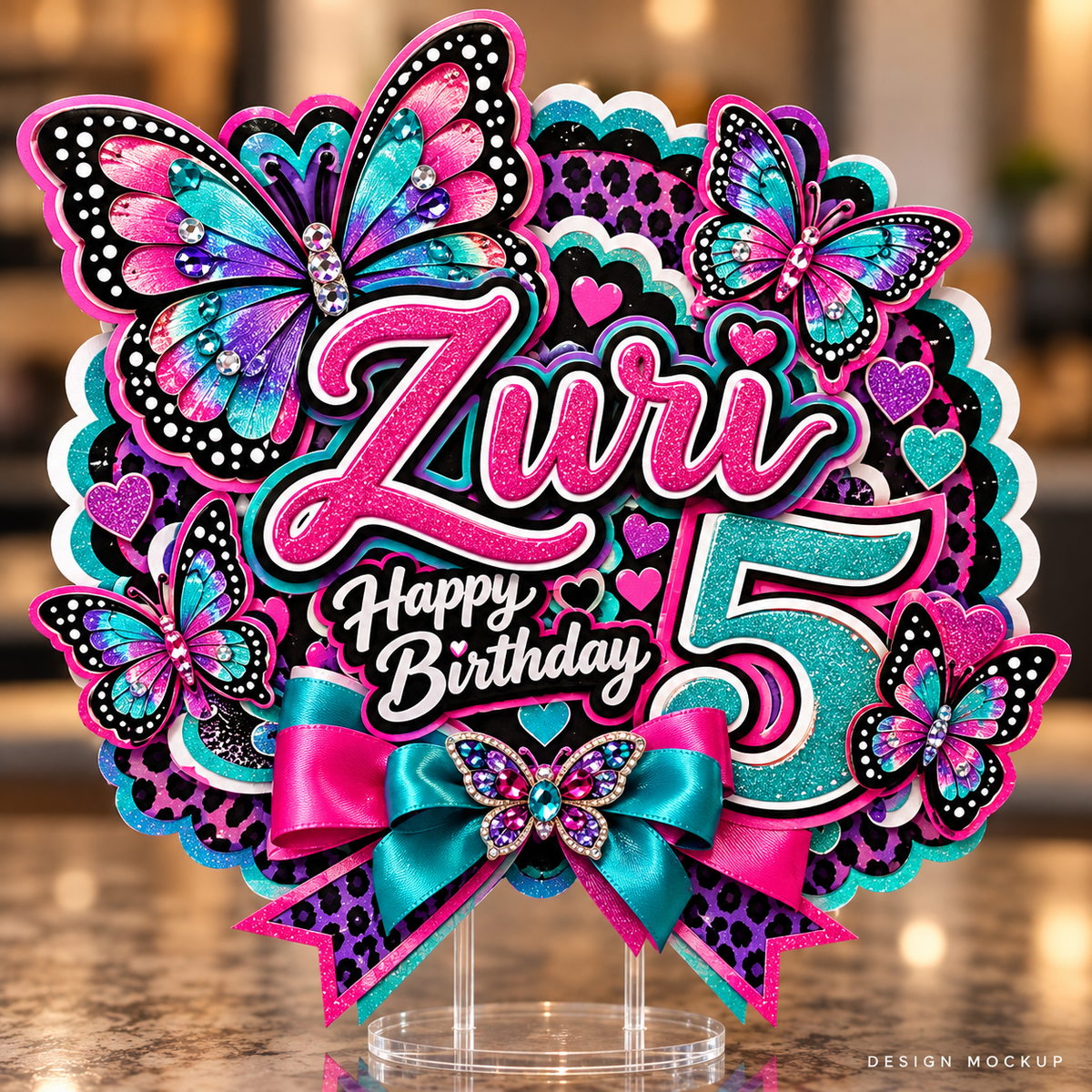 Design mockup of a personalized layered birthday cake topper with butterfly artwork