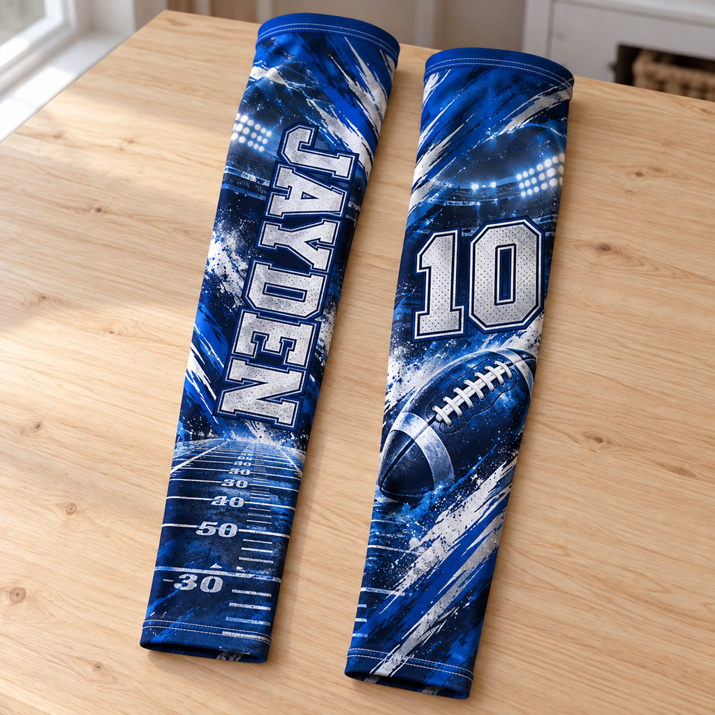 Blue and silver personalized football sleeve pair