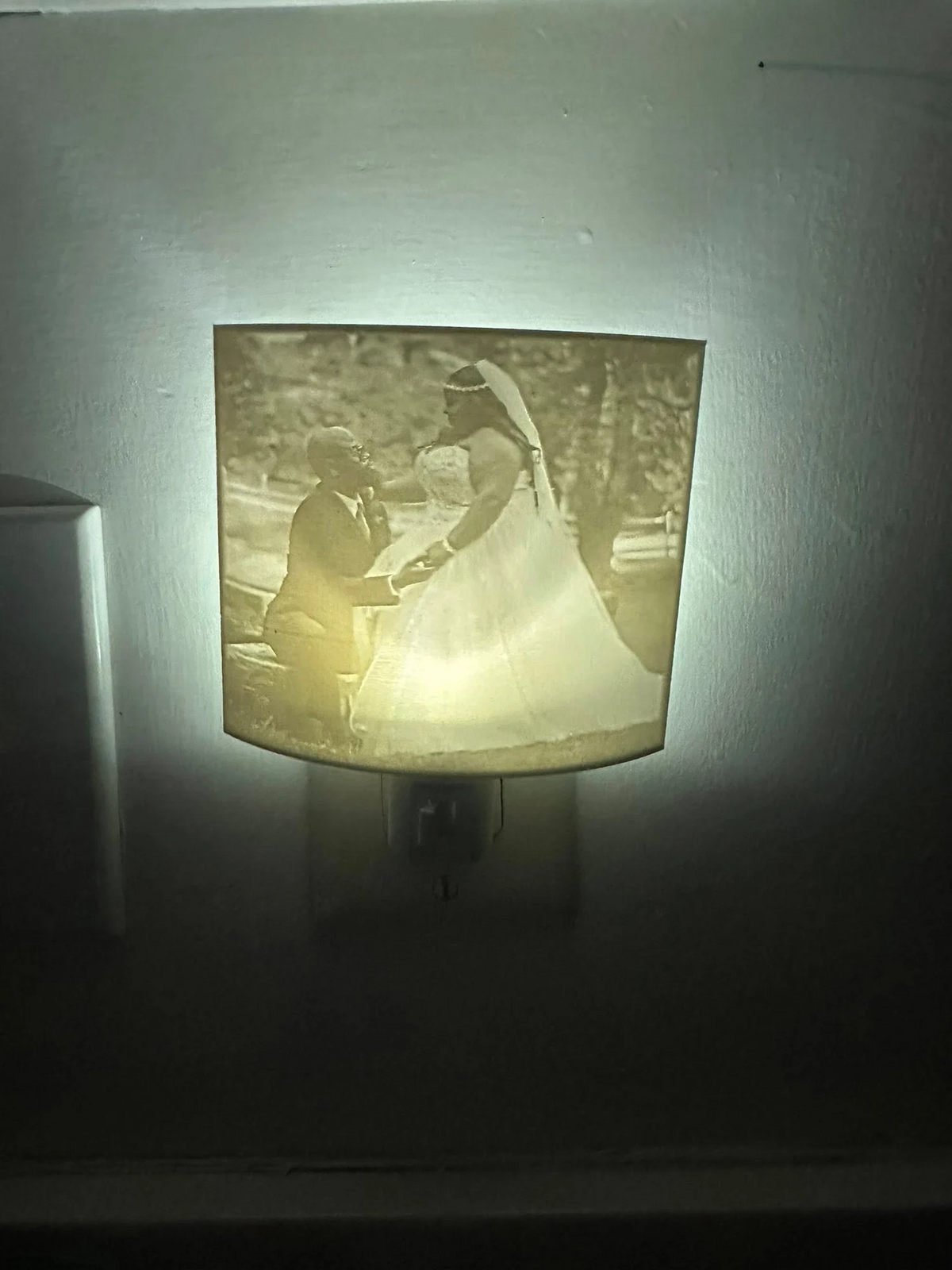 Photo lithophane plug-in night light showing a wedding portrait